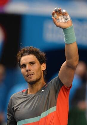 (140120) -- MELBOURNE, Jan. 20, 2014 (Xinhua) -- Rafael Nadal of Spain waves to the audience after the men s singles fourth round match at Australian Open tennis tournament in Melbourne, Australia, Jan. 20, 2014. . (Xinhua Li Jundong) (SP)AUSTRALIA-MELBOURNE-TENNIS 