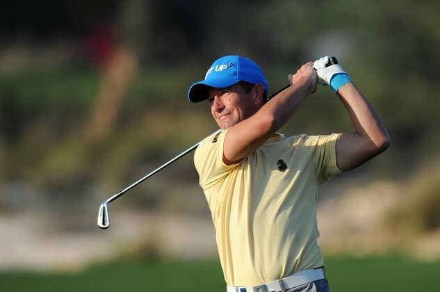 (140122) -- DOHA, Jan. 22, 2014 (Xinhua) -- Steve Webster of England hits the ball during the first day match at Qatar Masters in Doha, Qatar, Jan. 22, 2014. (Xinhua Chen Shaojin) (SP)QATAR-DOHA-GOLF-QATAR MASTERS 