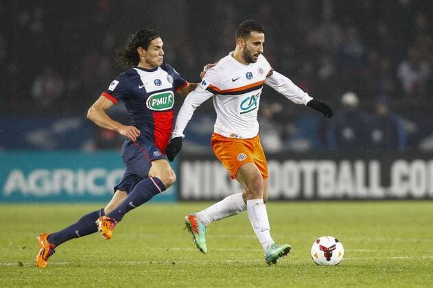Edinson Cavani (PSG) vs Abdelhamid El Kaoutari (MHSC) FOOTBALL : Paris Saint Germain vs Montpellier - Coupe de France - 22 01 2014 GwendolineLeGoff Panoramic 
