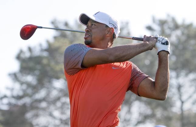 Jan. 22, 2014 - La Jolla, California, U.S. TIGER WOODS watches the flight of his ball after hitting from South Course 15th tee during the Pro-Am day of the Farmers Insurance Open at Torrey Pines Golf Course. Golf 2014 - Farmers Insurance Open - Pro-Am - ZUMAs44