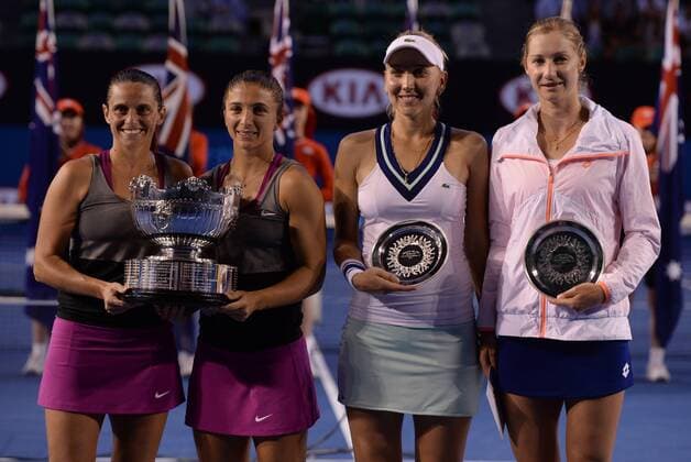 (140124) -- MELBOURNE, Jan. 24, 2014 (Xinhua) -- Sara Errani (2nd L) and Roberta Vinci (1st L) of Italy, Ekaterina Makarova (1st R) and Elena Vesnina of Russia pose for pictures after the women s doubles final match at 2014 Australian Open tennis tournament in Melbourne, Australia, Jan. 24, 2014. (Xinhua Li Jundong) (SP)AUSTRALIA-MELBOURNE-TENNIS-WOMEN S DOUBLES-FINAL 