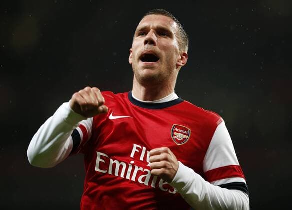 LONDON, Jan. 24, 2014 (Xinhua) -- Lukas Podolski of Arsenal celebrates scoring his second goal during FA Cup Fourth Round match between Arsenal and Coventry City at Emirates Stadium in London, Britain on Jan. 24, 2014. 