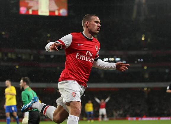 Arsenal s Lukas Podolski celebrates scoring his sides opening goal Arsenal vs Coventry City - FA Cup Fourth Round - Emirates Stadium - London - England - 24 01 2014 - Pic David Klein Sportimage EDITORIAL USE ONLY. No use with unauthorised audio, video, data, fixture lists, club league logos or live services. Online in-match use limited to 120 images, no video emulation. No use in betting, games or single club league player publications.