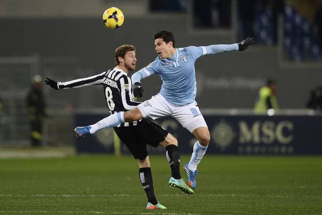 Db Roma 25 01 2014 - serie A Lazio Rom vs Juventus Turin foto DanielexBuffa Image Sport Pictured: Hernanes-Claudio Marchisio 