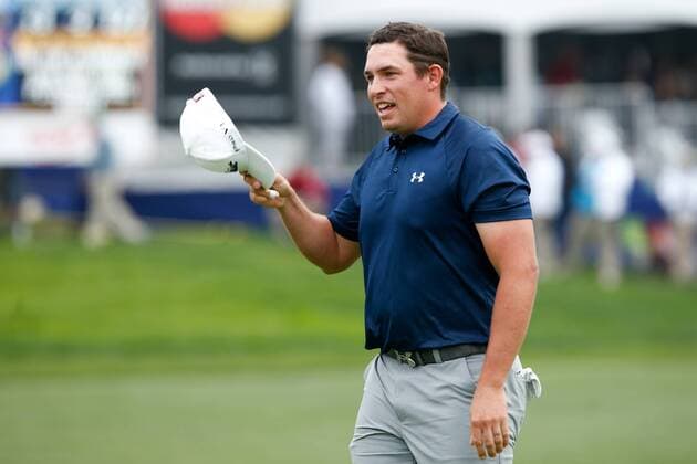 Jan. 26, 2014 - La Jolla, California, U.S - Scott Stallings tips his hat to the crowd after putting the 18th green during the final round of the Farmers Insurance Open golf tournament at Torrey Pines Municipal Golf Course. Farmers Insurance Open - Final Round - ZUMAw10
