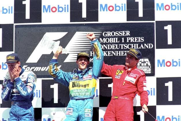 Siegerehrung Großer Preis von Deutschland 1995 mit Sieger Michael Schumacher (Deutschland Benetton Renault), David Coulthard (Schottland Williams Renault) und Gerhard Berger (Österreich Ferrari)
