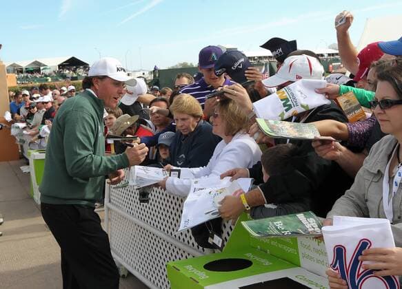 February 02, 2014: Phil Michelson (Rancho Santa Fe, CA) signs autographs for fans after he finishes at the 2014 Waste Management Phoenix Open at the TPC Stadium golf course in Scottsdale Arizona. . GOLF: FEB 02 PGA Golf Herren - Waste Management Phoenix Open - Final Round Icon20172895 EDITORIAL USE ONLY