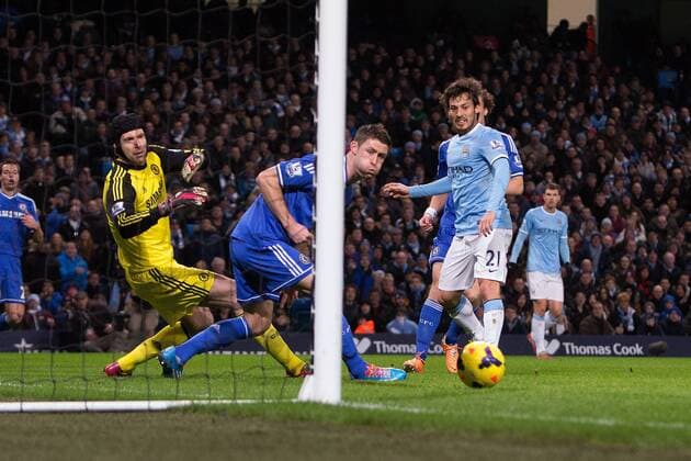 David Silva of Manchester City drags a shot wide of the goal- Manchester City vs. Chelsea FC - Barclays Premier League - Etihad Stadium - Manchester - 03 02 2014 EDITORIAL USE ONLY. No use with unauthorised audio, video, data, fixture lists, club league logos or live services. Online in-match use limited to 120 images, no video emulation. No use in betting, games or single club league player publications.