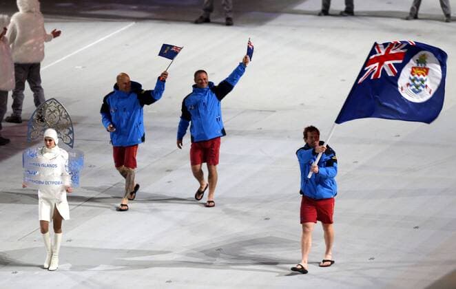 (140207) -- SOCHI, Feb. 7, 2014 (Xinhua) -- Dow Travers - Members of Cayman Islands delegation parade into the stadium during the opening ceremony for the 22nd Winter Olympic Games in Sochi, Russia, Feb. 7, 2014. (Xinhua Fei Maohua) (SP)OLY-RUSSIA-SOCHI-OPENING CEREMONY 