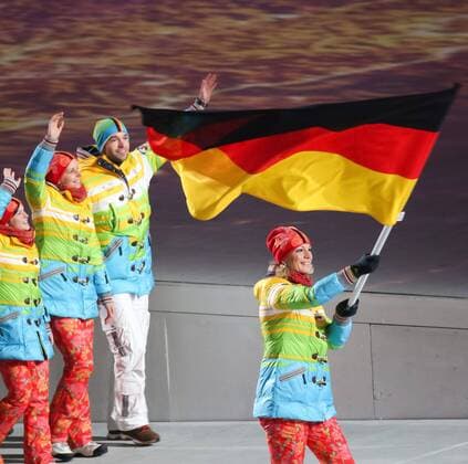 07.02.2014, Olympiastadion Fischt, Adler, RUS, Sochi 2014, Eröffnungsfeier der XXII. Olympischen Winterspiele, im Bild Team Deutschland mit Fahnentraegerin Maria Hoefl - Riesch Team Germany with flag bearer Maria Hoefl - Riesch during the Opening Ceremony of the Olympic Winter Games Sochi 2014 at the Fisht Olympic Stadium in Adler, Russia on 2014 02 07. Foto Eibner  EP_Gro  