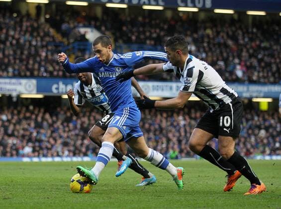 Chelsea s Eden Hazard goes past Newcastle s Hatem Ben Arfa Chelsea vs Newcastle United - Premier League - Stamford Bridge - London - England - 08 02 2014 - Pic David Klein Sportimage EDITORIAL USE ONLY. No use with unauthorised audio, video, data, fixture lists, club league logos or live services. Online in-match use limited to 120 images, no video emulation. No use in betting, games or single club league player publications.