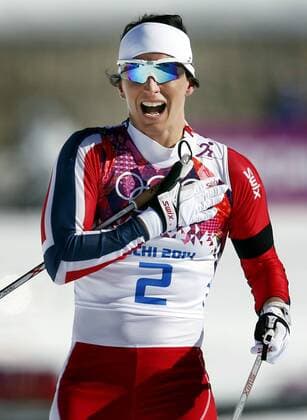 Feb. 8, 2014 - Sochi, MN, RUS - Marit Bjoergen of Norway celebrates after crossing the finish line for gold in the Women s 7.5m + 7.5m Skiathlon in the 2014 Winter Olympics in Sochi, Russia. WOMEN S SKIATHLON - ZUMAm67