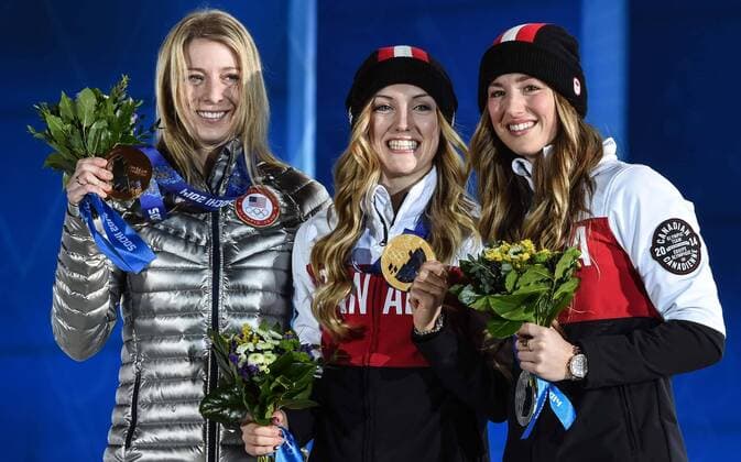 (140209) -- SOCHI, Feb. 9, 2014 (Xinhua) -- Gold medalist Justine Dufour-Lapointe (C) of Canada, silver medalist Chloe Dufour-Lapointe (R) of Canada and bronze medalist Hannah Kearney of the United States pose at the victory-ceremony of Women s Moguls of Freestyle Skiing at the Sochi 2014 Winter Olympic Games in Sochi, Feb. 9, 2014. (Xinhua Wang Haofei) (SP)OLY-RUSSIA-SOCHI-FREESTYLE SKIING-WOMEN MOGULS-VICTORY CEREMONY 