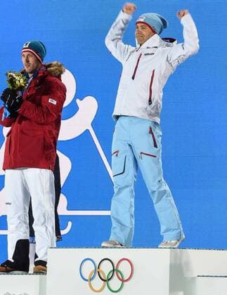 (140209) -- SOCHI, Feb. 9, 2014 (Xinhua) -- Gold medalist Ole Einar Björndalen (R) of Norway celebrates on the podium during the victory ceremony for the men s sprint 10 km of biathlon event at the Sochi 2014 Winter Olympic Games in Sochi, Feb. 9, 2014. (Xinhua Wang Haofei) (SP)OLY-RUSSIA-SOCHI-BIATHLON-MEN S SPRINT 10 KM-VICTORY CEREMONY 