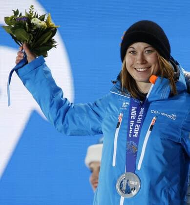 Feb. 9, 2014 - Sochi, Russian Federation - ENNI RUKAJARVI, 23, the Finnish snowboarder receiving the silver medal for Snowboard Ladies Slopestyle. Medal Ceremony was held in front of Olympic flame ion Olympic Park. Womens Snowboard Slopestyle - Sochi 2014 - ZUMAm30