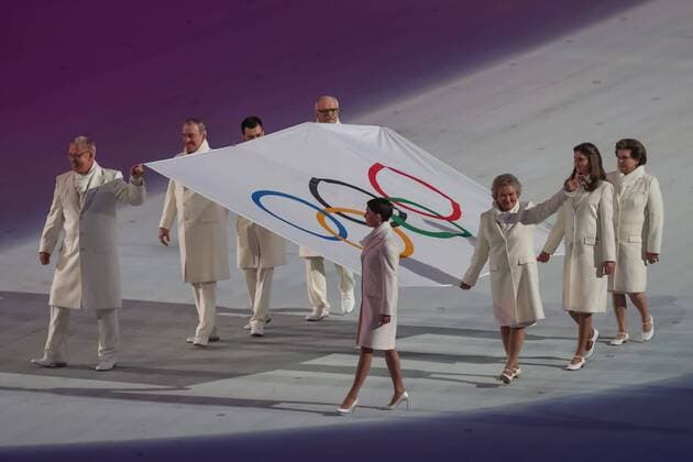 The XXII Winter Olympic Games 2014 in Sotchi, Olympics, Olympische Winterspiele Sotschi 2014 Opening ceremony, The Olympic flag being carried out at the opening ceremony of the XXII Olympic Winter Games in Sochi. The flag-bearers: conductor Valery Gergiyev, cyberathlete Alan Yenileyev, film director Nikita Mikhalkov,cosmonaut Valentina Tereshkova, correspondent Anastasia Popova, six-time Olympic champion Lidiya Skoblikova and actress Chulpan Khamatova. xMaltexChristiansx
