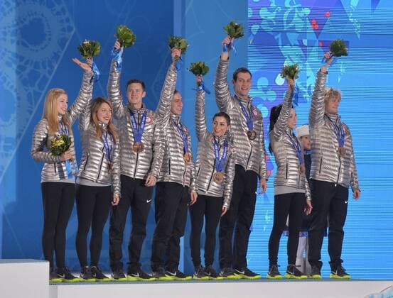 The United States team celebrates during their victory ceremony for the figure skating team event at the Sochi 2014 Winter Olympics on February 10, 2014 in Sochi, Russia. The United States won a bronze medal in the event.  OLY20140210190