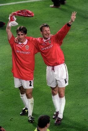 Gary Neville and Teddy Sheringham celebrate - UEFA Champions League final 1999 - Manchester United vs Bayern Munich at the Now Camp Stadium, Barcelona, Spain - 26th May 1999 Pictures Simon Bellis Sportimage EDITORIAL USE ONLY. No use with unauthorised audio, video, data, fixture lists, club league logos or live services. Online in-match use limited to 120 images, no video emulation. No use in betting, games or single club league player publications.