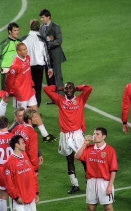 Andy Cole stands in disblief after winning the final in time added on - UEFA Champions League final 1999 - Manchester United vs Bayern Munich at the Now Camp Stadium, Barcelona, Spain - 26th May 1999 Pictures Simon Bellis Sportimage EDITORIAL USE ONLY. No use with unauthorised audio, video, data, fixture lists, club league logos or live services. Online in-match use limited to 120 images, no video emulation. No use in betting, games or single club league player publications.