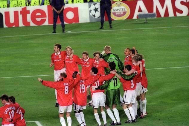 Manchester United dance on the pitch - UEFA Champions League final 1999 - Manchester United vs Bayern Munich at the Now Camp Stadium, Barcelona, Spain - 26th May 1999 Pictures Simon Bellis Sportimage EDITORIAL USE ONLY. No use with unauthorised audio, video, data, fixture lists, club league logos or live services. Online in-match use limited to 120 images, no video emulation. No use in betting, games or single club league player publications.