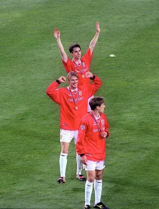 David Beckham and Gary and Phil Neville celebrate - UEFA Champions League final 1999 - Manchester United vs Bayern Munich at the Now Camp Stadium, Barcelona, Spain - 26th May 1999 Pictures Simon Bellis Sportimage EDITORIAL USE ONLY. No use with unauthorised audio, video, data, fixture lists, club league logos or live services. Online in-match use limited to 120 images, no video emulation. No use in betting, games or single club league player publications.