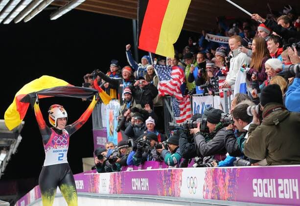 ITAR-TASS: SOCHI, RUSSIA. FEBRUARY 11, 2014. Germany s Natalie Geisenberger (Gold) celebrates winning the women s luge singles, at the 22nd Winter Olympics, at the Sanki Sliding Centre.  premiumd Aufmacher 20174792