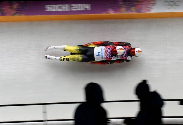 (140212) -- SOCHI, Feb. 12, 2014 (Xinhua) -- Tobias Wendl and Tobias Arlt of Germany compete during the Luge Doubles at the 2014 Sochi Winter Olympic Games in Sochi, Russia, Feb. 12, 2014. Tobias Wendl and Tobias Arlt won the gold medal with 1 minute and 38.933 seconds. (Xinhua Li Gang) (SP)OLY-RUSSIA-SOCHI-LUGE-DOUBLES 