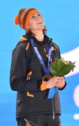 Bronze medalist, Netherland s Margot Boer, reacts after receiving her medal during the victory ceremony for the ladies speed skating 500m at the Sochi 2014 Winter Olympics on February 12, 2014 in Sochi, Russia.  OLY20140212350