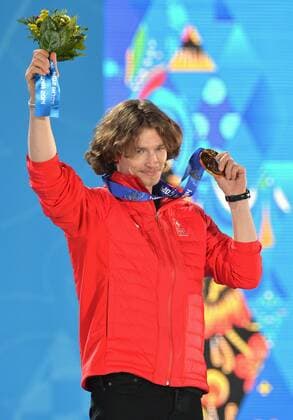 Gold medalist, Switzerland s Louri Podladtchikov, celebrates during the victory ceremony for men s snowboard halfpipe, at the Sochi 2014 Winter Olympics on February 12, 2014 in Sochi, Russia.  OLY20140212358