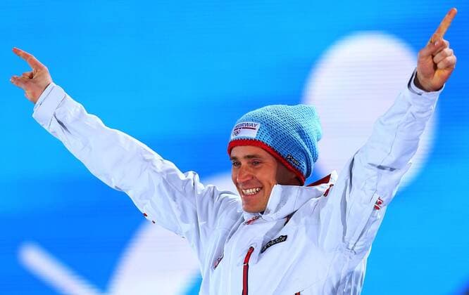 (140212) -- SOCHI, Feb. 12, 2014 (Xinhua) -- Gold medalist Ola Vigen Hattestad of Norway celebrates during the awarding ceremony for the men s sprint free of cross-country skiing event at the 2014 Sochi Winter Olympic Games in Sochi, Russia, Feb. 12, 2014. (Xinhua Gong Bing) (SP)OLY-RUSSIA-SOCHI-CROSS-COUNTRY SKIING-MEN S SPRINT FREE 