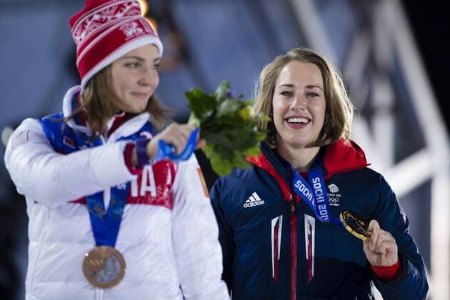 15.02.2014 Sochi, Krasnodar Krai, Russia. Lizzy YARNOLD (GBR) proudly displaying her Gold medal during the Medal Ceremony for the Women s Skeleton at the Sochi Medals Plaza, Coastal Cluster - XXII Olympic Winter Games xCraigxMercerx  ActionPlus20172926