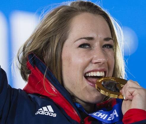 15.02.2014 Sochi, Krasnodar Krai, Russia. Lizzy YARNOLD (GBR) proudly displaying her Gold medal during the Medal Ceremony for the Women s Skeleton at the Sochi Medals Plaza, Coastal Cluster - XXII Olympic Winter Games xCraigxMercerx  ActionPlus20172927