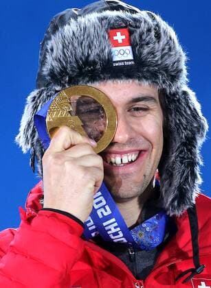 OLYMPIA - Olympische Spiele 2014 SOTSCHI,RUSSLAND,15.FEB.14 - DIVERS, OLYMPIA, SKI ALPIN - Olympische Winterspiele Sotschi 2014, Superkombination der Herren, Siegerehrung, Medaillenvergabe am Medal Plaza. Bild zeigt Sandro Viletta (SUI). Keywords: Medaillie. 
