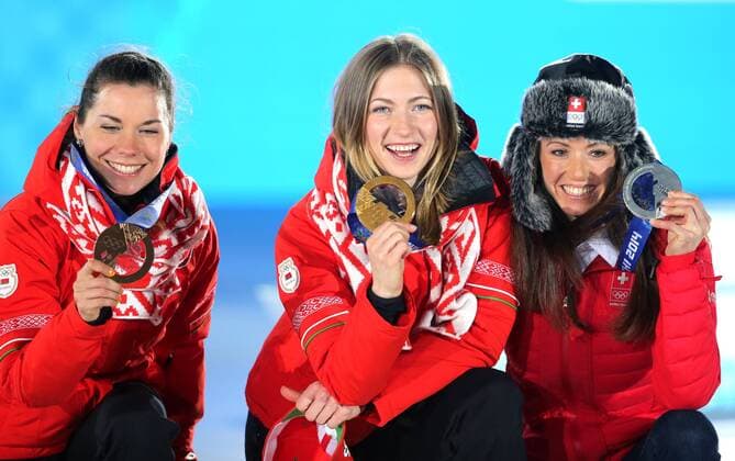 OLYMPIA - Olympische Spiele 2014 SOTSCHI,RUSSLAND,15.FEB.14 - DIVERS, OLYMPIA, BIATHLON - Olympische Winterspiele Sotschi 2014, 15km Einzel der Damen, Siegerehrung, Medaillenvergabe am Medal Plaza. Bild zeigt Nadezhda Sardino (BLR), Darya Domracheva (BLR) und Selina Gasparin (SUI). Keywords: Medaillie. 
