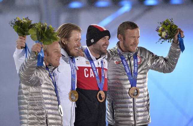 United States Andrew Weibrecht, Norway s Kjetil Jansrud and United States Bode Miller and Canada s Jan Hudec during the victory ceremony for alpine skiing men s Super G at the Sochi 2014 Winter Olympics on February 16, 2014 in Sochi, Russia. Jansrud won gold, Weibrecht silver while Miller and Hudec tied for bronze in the event.  OLY20140216158