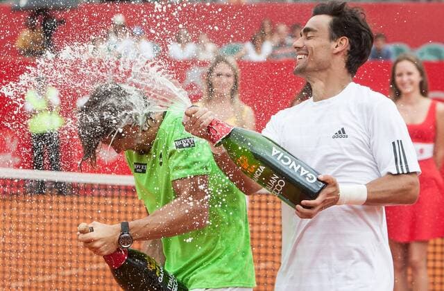 David Ferrer (L) of Spain and Fabio Fognini of Italy celebrate during the awarding ceremony after their 2014 ATP Tennis Herren Buenos Aires final tennis match, in Buenos Aires, Argentina, on Feb. 16, 2014.(Xinhua Martin Zabala) (vf) (ah) (SP)ARGENTINA-BUENOS AIRES-TENNIS-ATP 