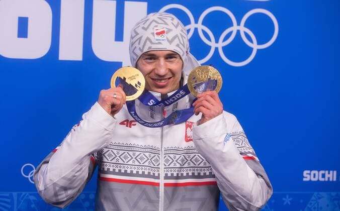 16 02 2014 SOCHI RUSSIA OLYMPIC VILLAGE WINTER OLYMPIC GAMES SOCHI 2014 MEDAL PLAZA, Siegerehrung Großschanze und Normalschanze: KAMIL STOCH  JAG160214_142