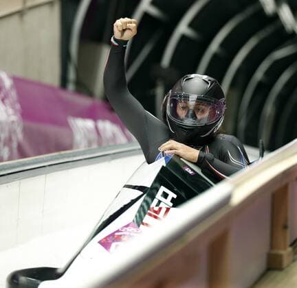 Feb. 18, 2014 - Sochi, Russia - USA-1 driver Elana Meyers celebrates with teammate Lauryn Williams after their second run in the Women s Two-Man Bobsled at the Sanki Sliding Center at the 2014 Sochi Winter Olympics. USA-1 had the top results after two runs. Women s Bobsleigh - Sochi 2014 - ZUMAsc5