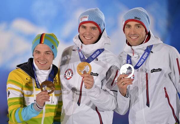 Norway s Magnus Hovdal Moan (L-R), Norway s Joergen Graabak and Germany s Fabian Riessle pose with their silver, gold and bronze medals during the victory ceremony for nordic combined individual Gunderson long hill 10km at the Sochi 2014 Winter Olympics on February 19, 2014 in Sochi, Russia.  OLY20140219137