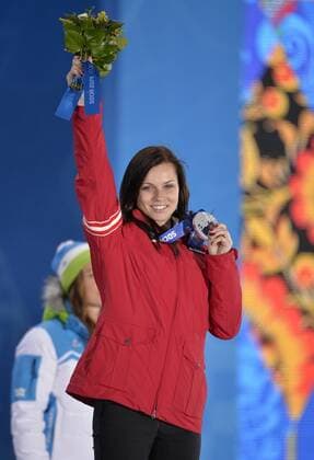 Austria s Anna Fenninger holds her silver medal during the victory ceremony for ladies alpine skiing giant slalom at the Sochi 2014 Winter Olympics on February 19, 2014 in Sochi, Russia.  OLY20140219118