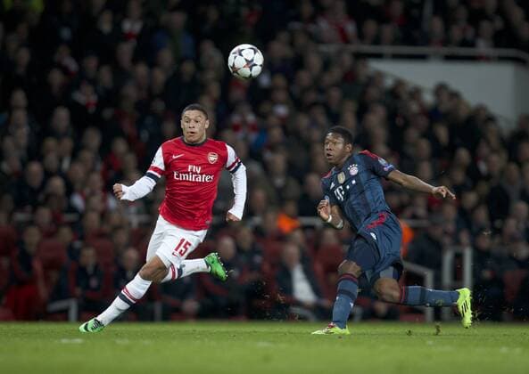 19.02.2014 London, England. Alex Oxlade-Chamberlain of Arsenal looks to go past David Alaba of Bayern Munich during the Champions League game between Arsenal and Bayern Munich from the Emirates Stadium. xNigelxCookex  ActionPlus11500228