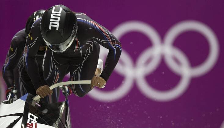 (140219) -- SOCHI, Feb. 19, 2014 (Xinhua) -- Elana Meyers and Lauryn Williams of the United States compete during the women s bobsleigh competition at the 2014 Sochi Winter Olympic Games in Sochi, Russia, Feb. 19, 2014. Elana Meyers and Lauryn Williams won the silver medal of the event. (Xinhua Fei Maohua) (SP)OLY-RUSSIA-SOCHI-WOMEN S BOBSLEIGH 