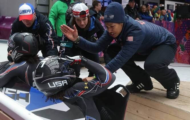 Feb. 19, 2014 - Sochi, Krasnodar Krai, Russia - USA s Jazmine FENLATOR(right) congratulates teammate Lauryn WILLIAMS after she and Elana MEYERS won Silver for the USA in the Women s Bobsleigh event at the Winter Olympics on February 19 in Sochi, Russia. Women s Bobsleigh - Sochi 20144 - ZUMAa35