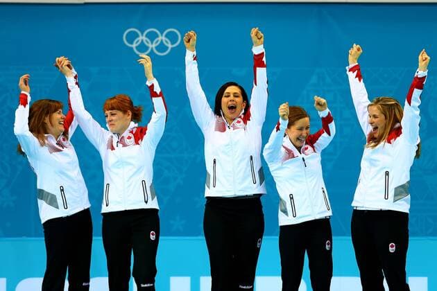 (140220) -- SOCHI, Feb. 20, 2014 (Xinhua) -- Players of Canada celebrate during the flower ceremony after the women s gold medal competition of curling event between Canada and Sweden at the 2014 Sochi Winter Olympic Games in Sochi, Russia, Feb. 20, 2014. Canada won 6-3 and claimed the gold medal of the event. (Xinhua Gong Bing) (SP)OLY-RUSSIA-SOCHI-CURLING-WOMEN S GOLD MEDAL-CAN VS SWE 