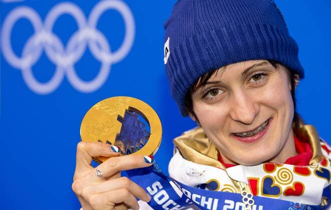 Women s 5,000-meter speedskating gold medalist Martina Sablikova of the Czech Republic poses with her medal at the 2014 Winter Olympics in Sochi, Russia, Thursday, February 20, 2014. (CTKxPhoto RomanxVondrous) CTKPhotoP201402201067501  vnd