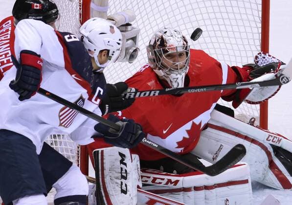 Feb. 21, 2014 - Sochi, RUS - Canada goalie Carey Price (31) protects the goal against USA forward Zach Parise (9) in the first period of a men s hockey semifinal at Bolshoy Ice Dome during the Winter Olympics in Sochi, Russia, Friday, Feb. 21, 2014. USA vs Canada Hockey - ZUMAm67