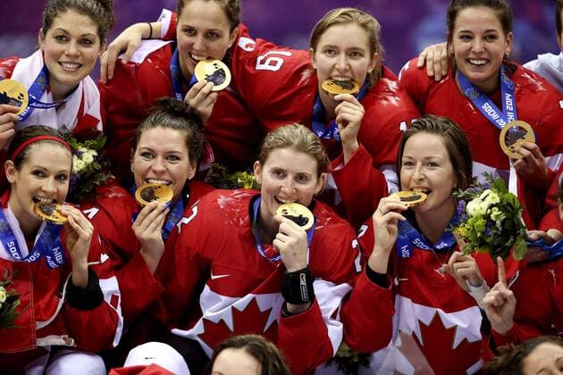 Feb. 20, 2014 - Sochi - Team Canada members including Rebecca Johnston of Sudbury, ON., Lauriane Rougeau of Beaconsfield, QC., Brianne Jenner of Oakville, ON., Melodie Daoust of Valleyfield, QC., Meaghan Mikkelson of St. Albert, AB., Natalie Spooner of Scarborough, ON., Hayley Wickenheiser of Shaunavon, SK., and Tara Watchorn of Newcastle, ON., celebrate after beating Team USA 3-2 in overtime to win the women s ice hockey gold medal at the Bolshoy Ice Dome at the Sochi 2014 Winter Olympics in Sochi, on Thursday Feb. 20, 2014. Al Charest Calgary Sun QMI Agency OLY2014 Team Canada vs Team USA in the women s ice hockey gold medal game at the Bolshoy Ice Dome during the Sochi 2014 Winter Olympics - ZUMAq06