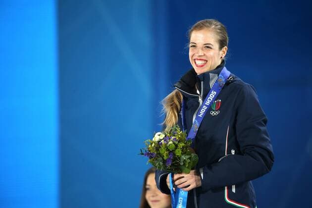 OLYMPIA - Olympische Spiele 2014 SOTSCHI,RUSSLAND,21.FEB.14 - DIVERS, OLYMPIA, EISKUNSTLAUF - Olympische Winterspiele Sotschi 2014, Eiskunstlauf, Damen, Siegerehrung, Medaillenvergabe am Medal Plaza. Bild zeigt Carolina Kostner (ITA). Keywords: Medaille. 