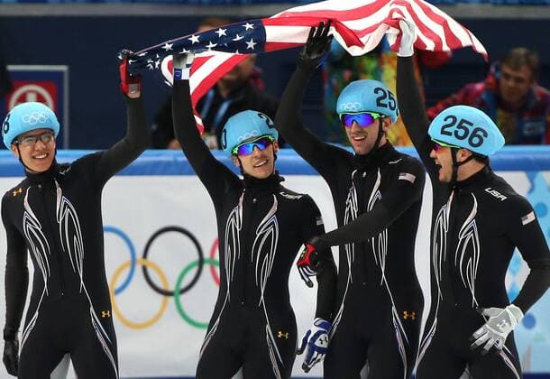 The U.S. team celebrates after winning the silver medal during the short track: men s 5000m relay during the Sochi Winter Olympics on February 21, 2014..  OLY20140221502