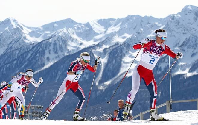 ITAR-TASS: SOCHI, RUSSIA. FEBRUARY 22, 2014. Norway s Marit Bjoergen and Kristin Stoermer Steira (R-L) compete in the women s cross-country skiing 30km mass start free event at the 22nd Winter Olympic Games in Sochi, at the Laura Ski Center.  Aufmacher premiumd RE13A9BF